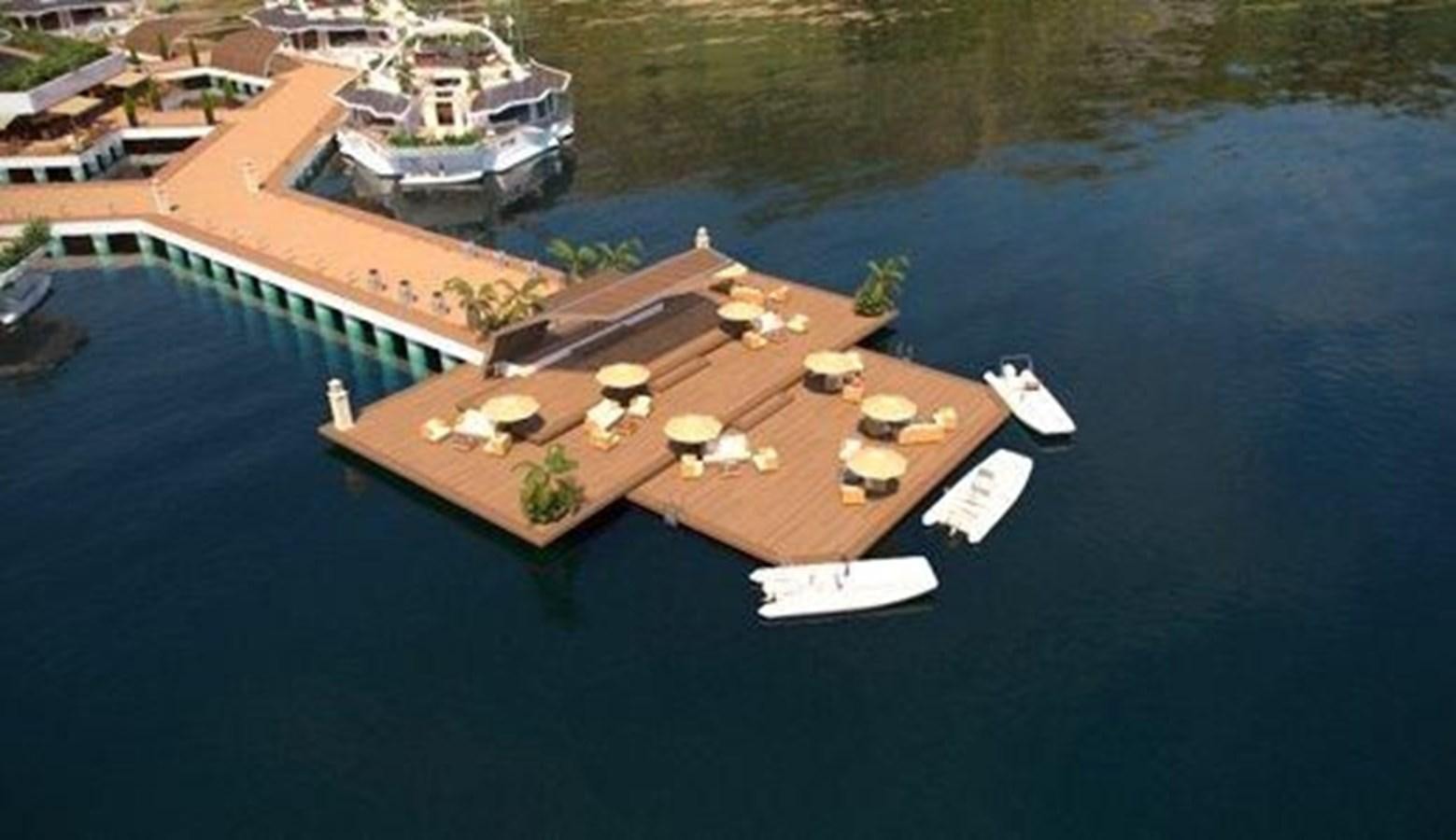 a dock with boats and a dock aboard 2020 ORION ORSOS ISLAND Yacht for Sale