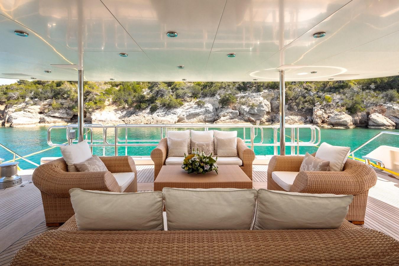 a room with a view of a city and water aboard VERA Yacht for Sale