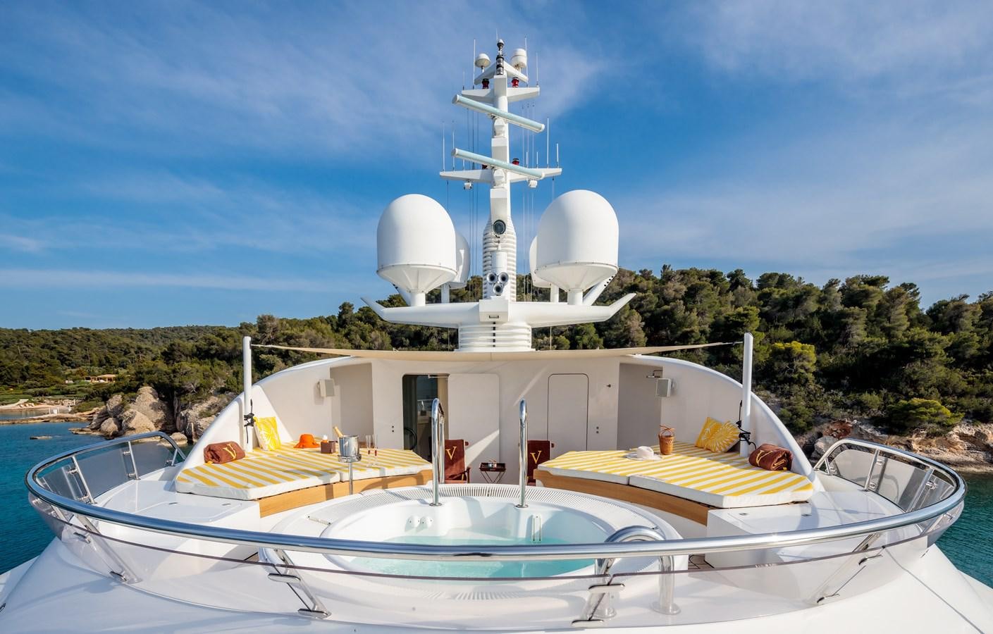 a boat with a satellite dish on top aboard VERA Yacht for Sale