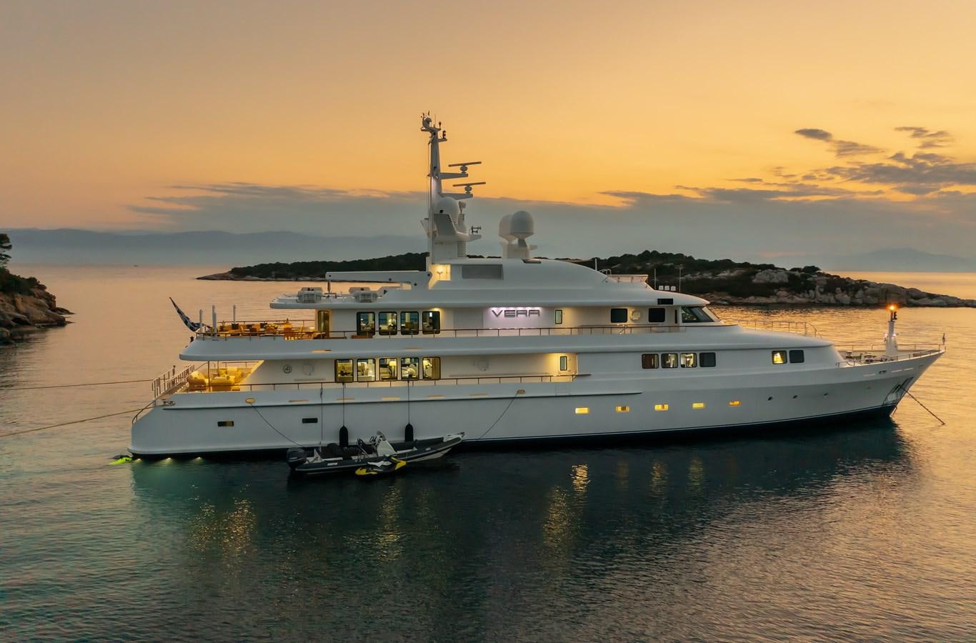 a large ship in the water aboard VERA Yacht for Sale