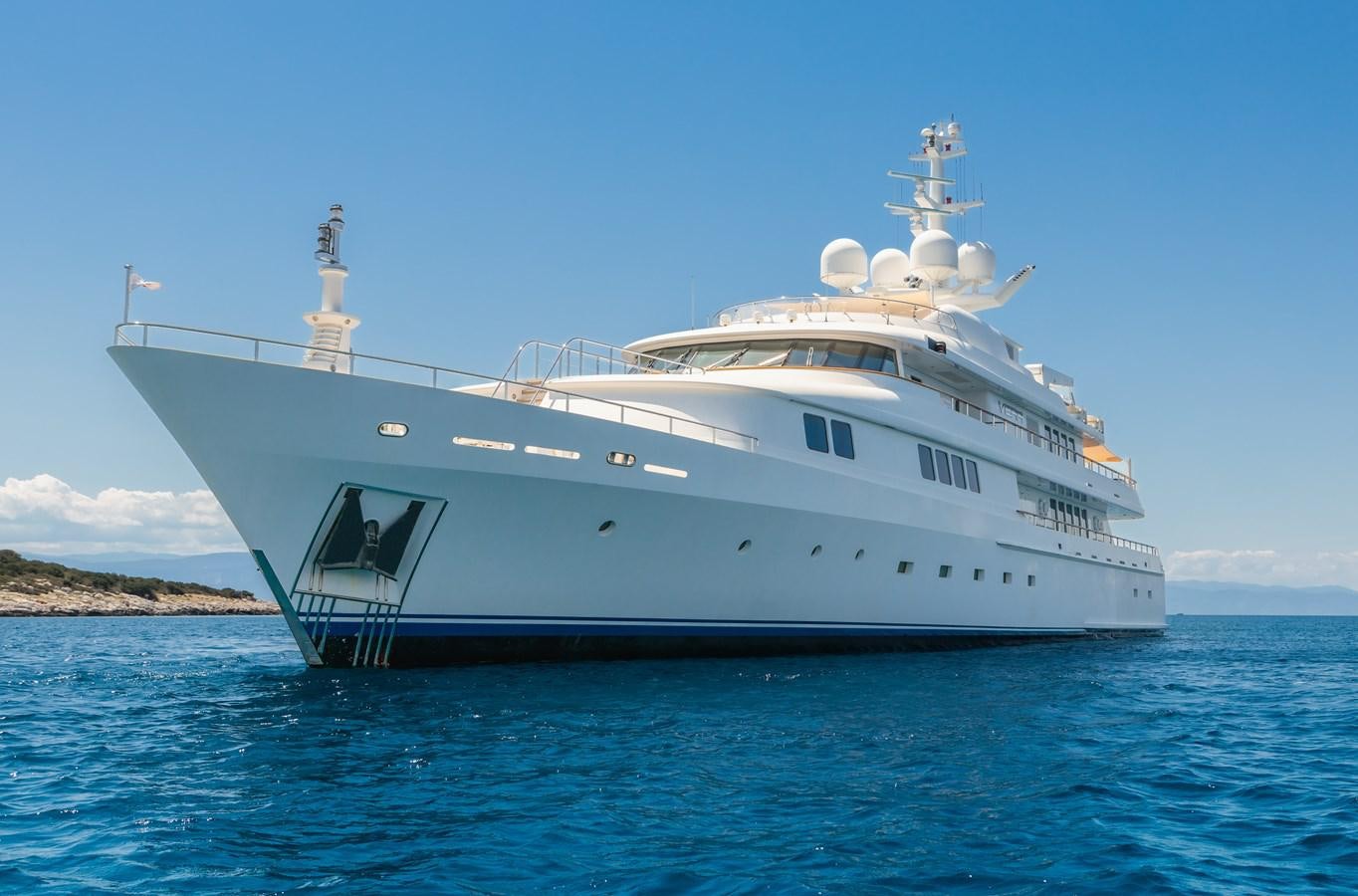 a large white ship in the water aboard VERA Yacht for Sale