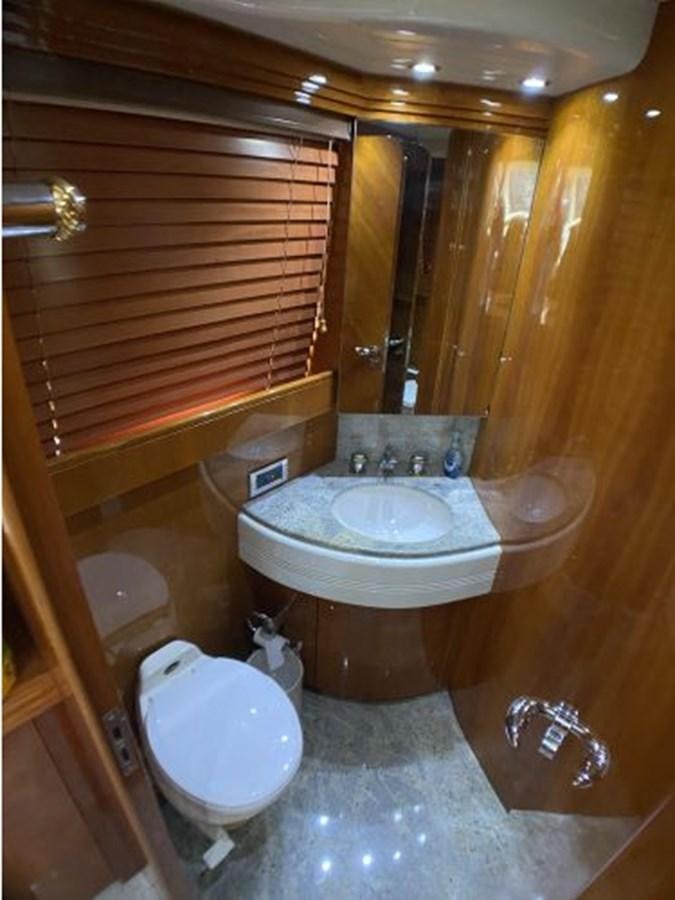 a bathroom with a sink and toilet aboard 85 AZIMUT ULTIMATE Yacht for Sale