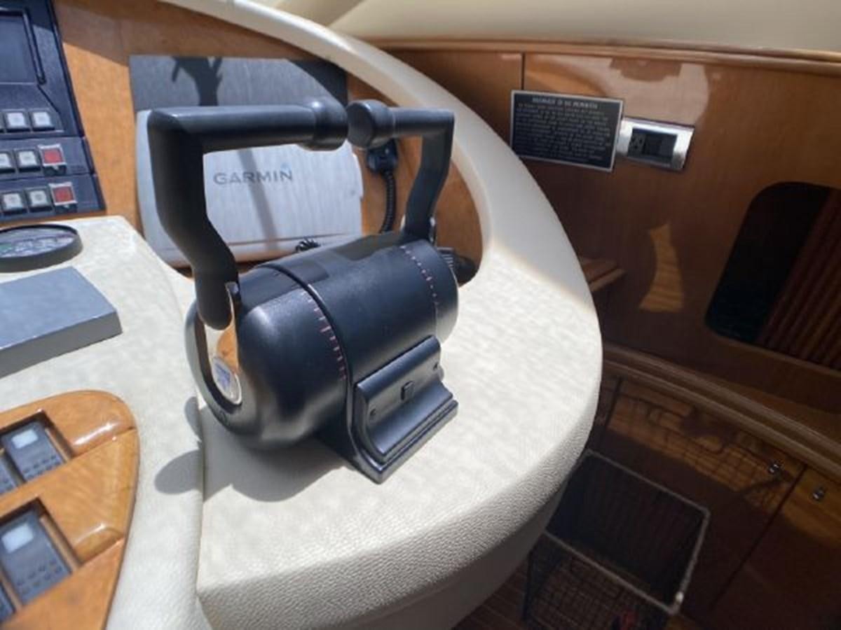 a black and white headphones on a white surface aboard 85 AZIMUT ULTIMATE Yacht for Sale