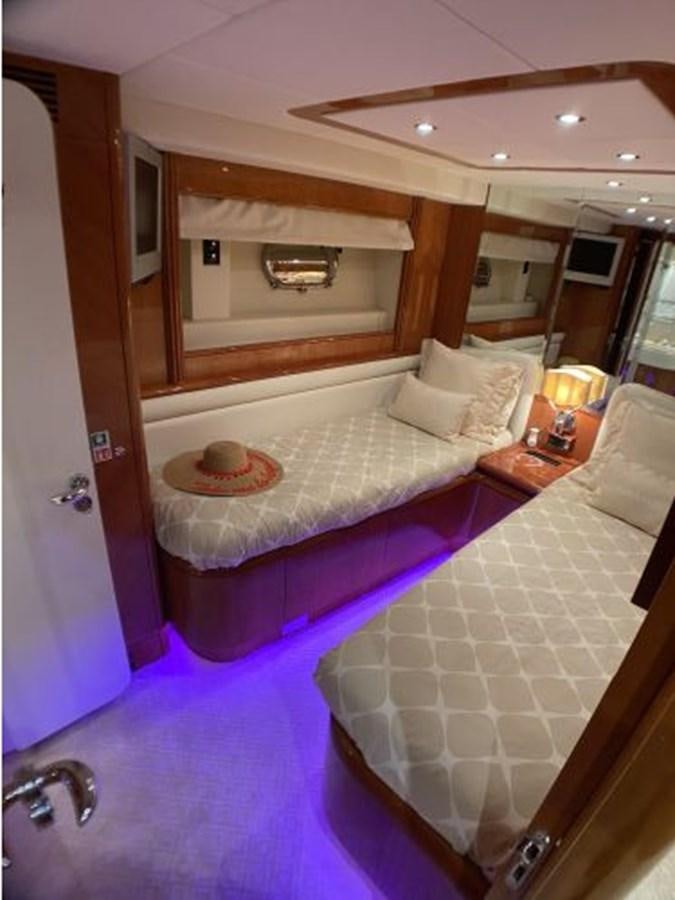 a large bed in a hotel room aboard 85 AZIMUT ULTIMATE Yacht for Sale