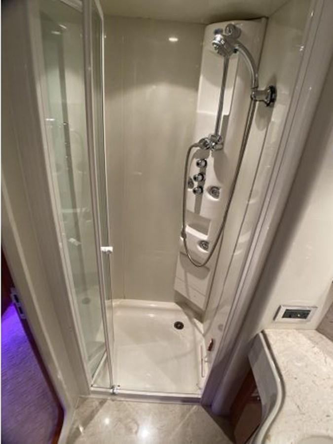 a shower with a glass door aboard 85 AZIMUT ULTIMATE Yacht for Sale