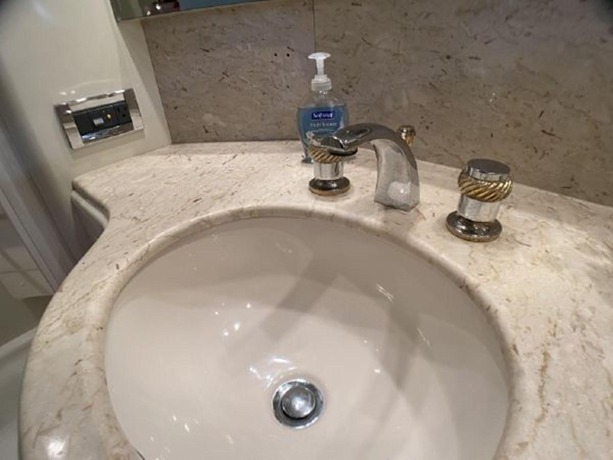 a sink with a faucet aboard 85 AZIMUT ULTIMATE Yacht for Sale