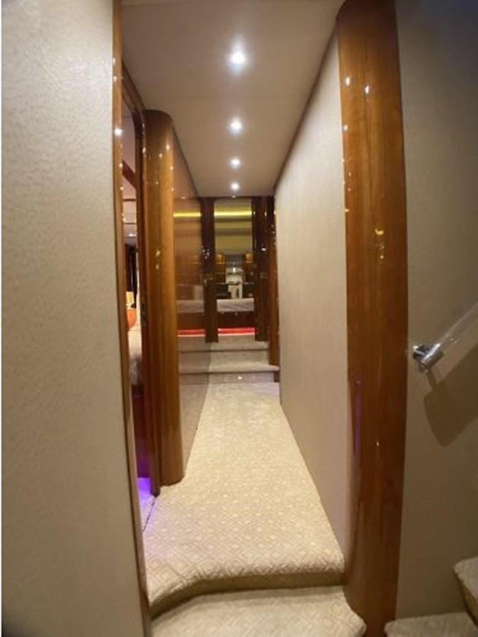 a hallway with a white carpet aboard 85 AZIMUT ULTIMATE Yacht for Sale