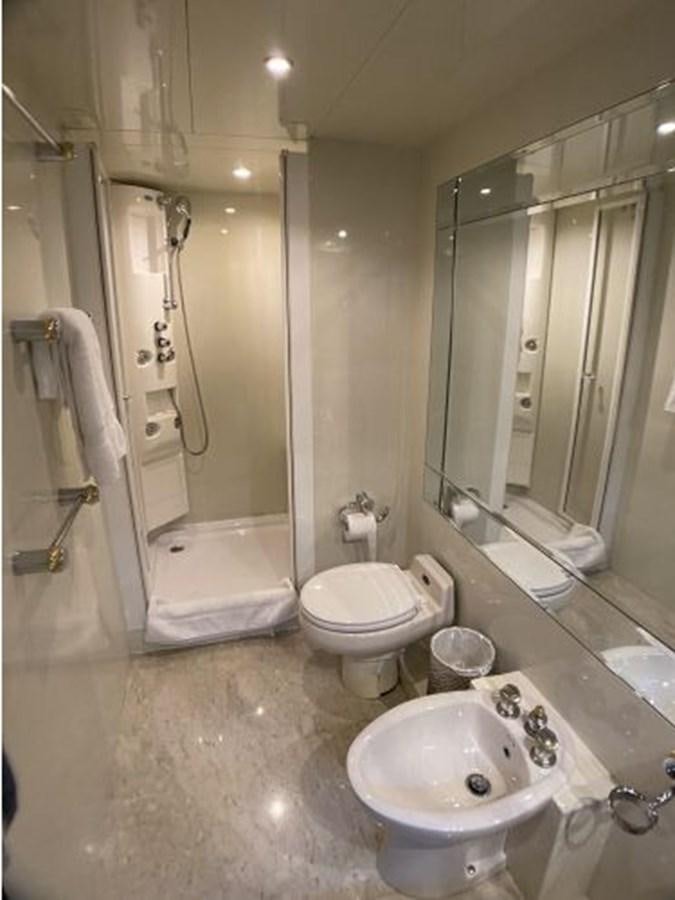a bathroom with a glass shower aboard 85 AZIMUT ULTIMATE Yacht for Sale