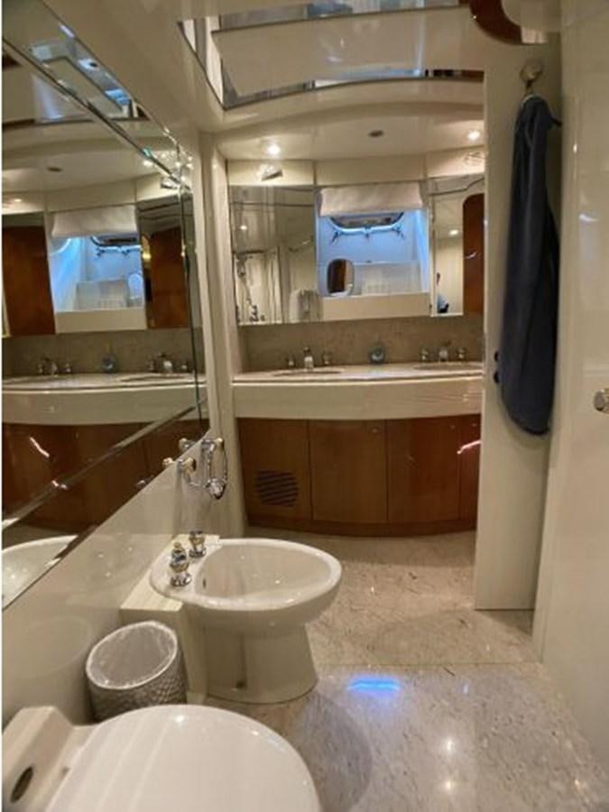 a bathroom with a large mirror aboard 85 AZIMUT ULTIMATE Yacht for Sale