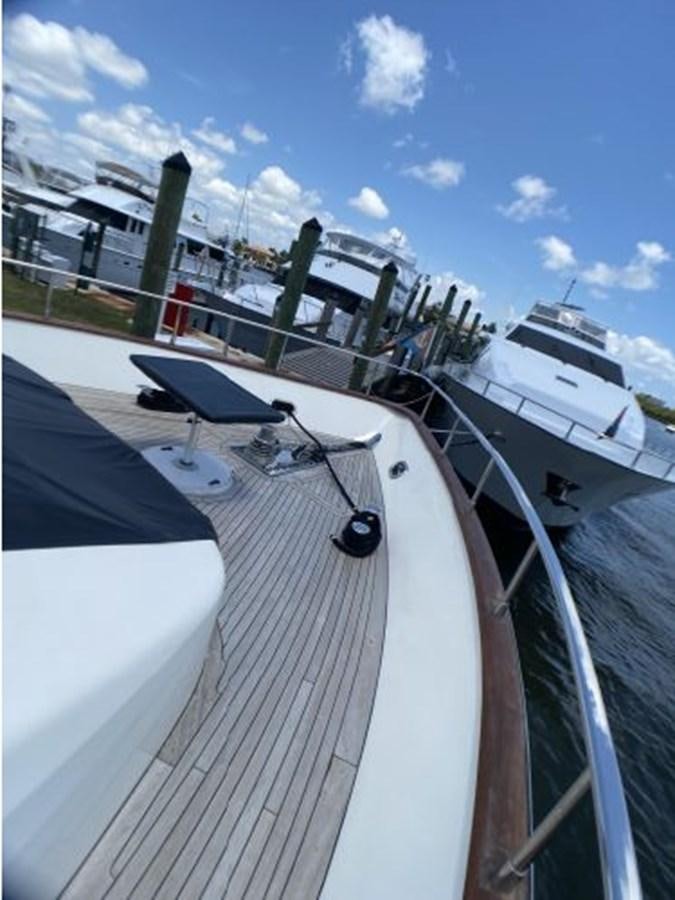 a boat is parked on the side of the dock aboard 85 AZIMUT ULTIMATE Yacht for Sale