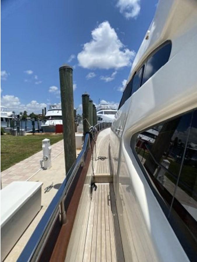 a deck with a water hose aboard 85 AZIMUT ULTIMATE Yacht for Sale