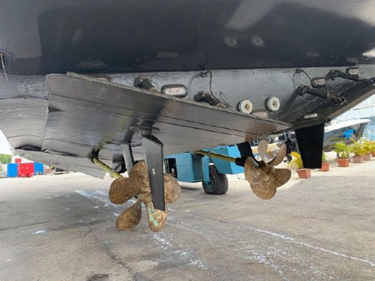 a car with a cat under it aboard 85 AZIMUT ULTIMATE Yacht for Sale