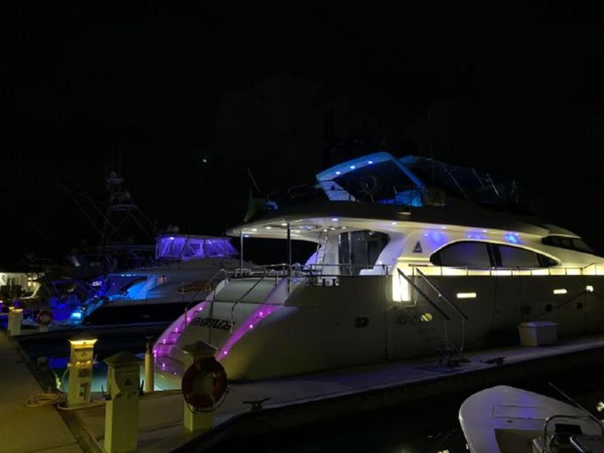 a boat on a dock aboard 85 AZIMUT ULTIMATE Yacht for Sale