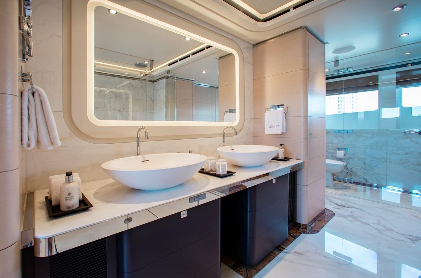 a bathroom with two sinks aboard LADY L Yacht for Charter