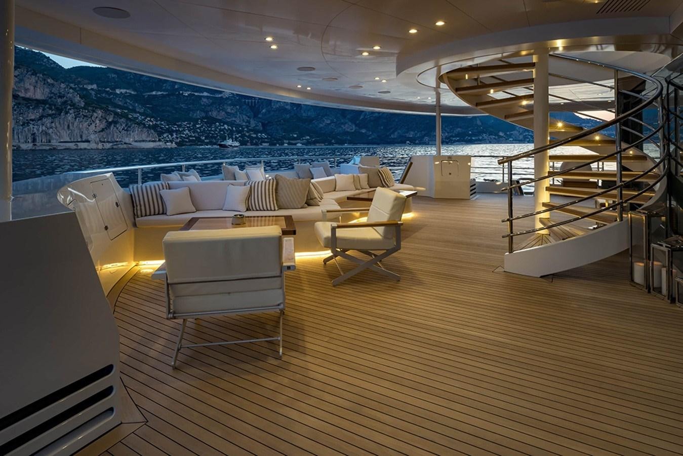 a room with a couch and a pool aboard MARQUISE Yacht for Charter