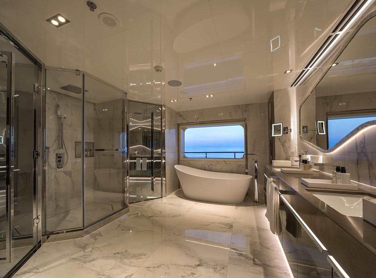 a bathroom with a large glass shower aboard MARQUISE Yacht for Charter