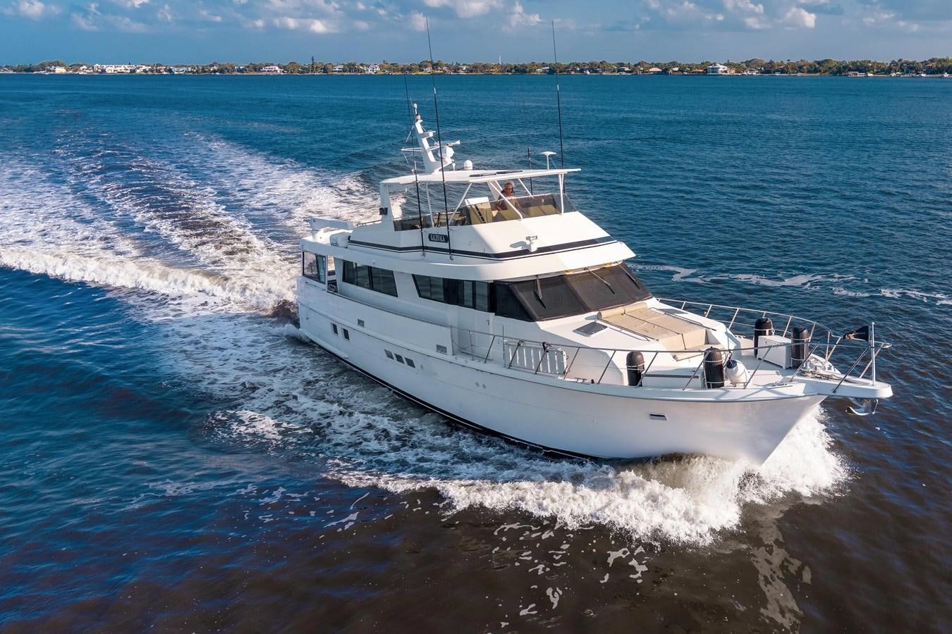a white boat on the water aboard KALEVALA Yacht for Sale