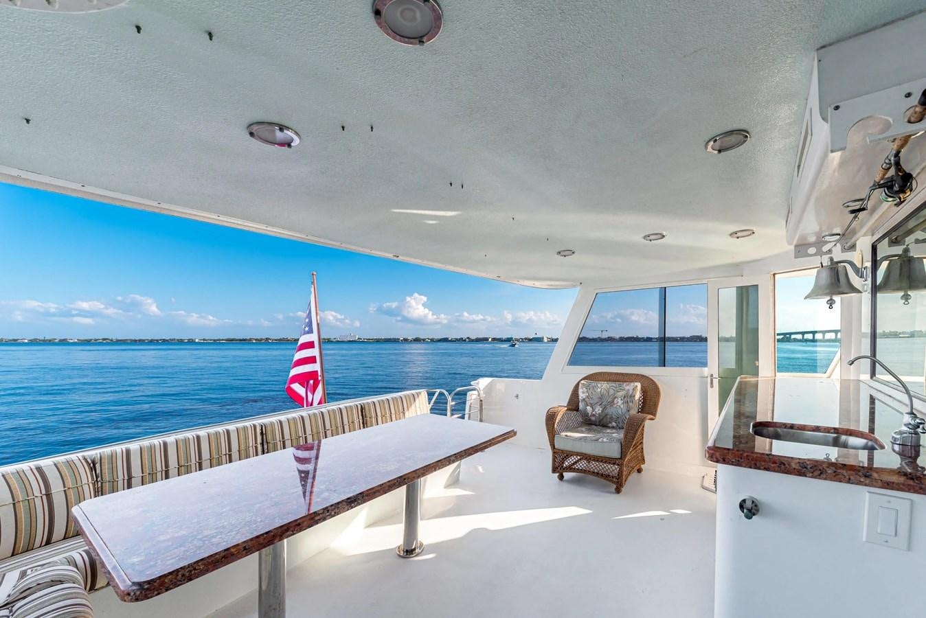 a room with a table and chairs aboard KALEVALA Yacht for Sale