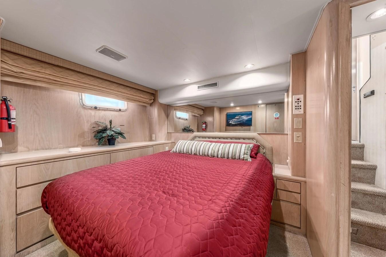 a bedroom with a bed aboard KALEVALA Yacht for Sale