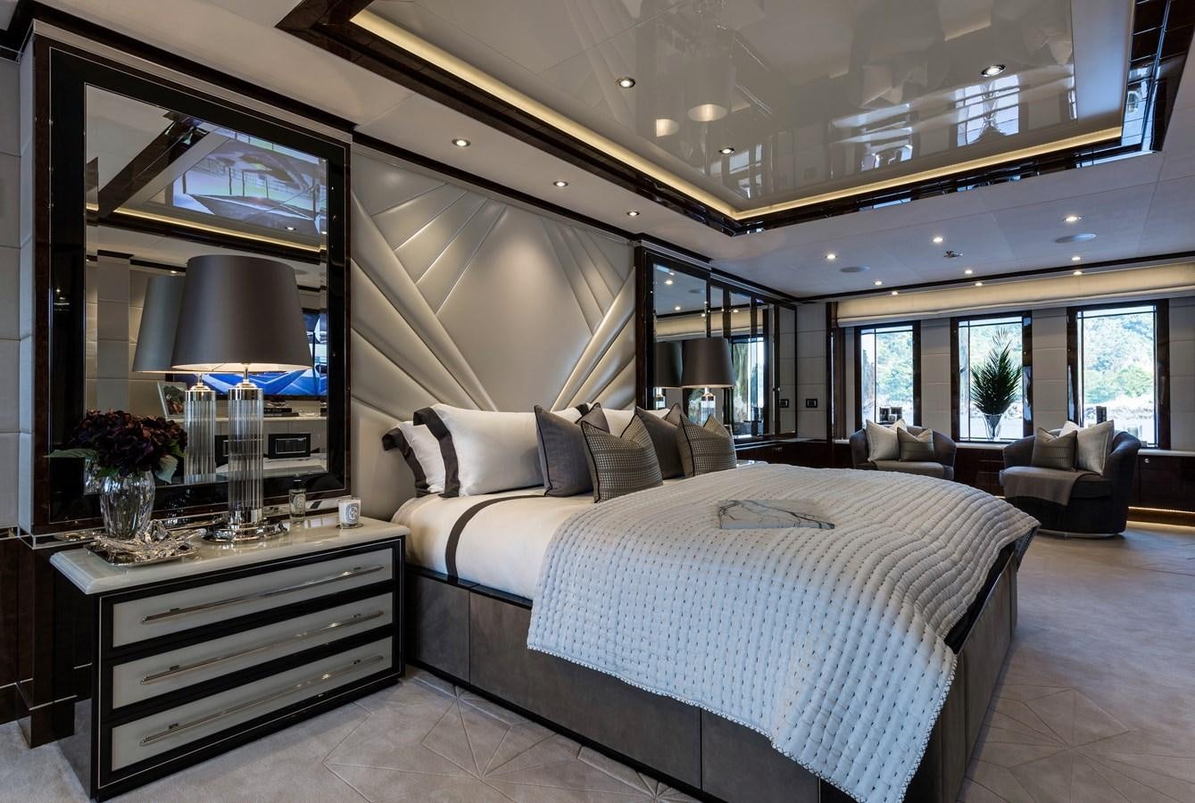a large bedroom with a large bed aboard SOUNDWAVE Yacht for Sale