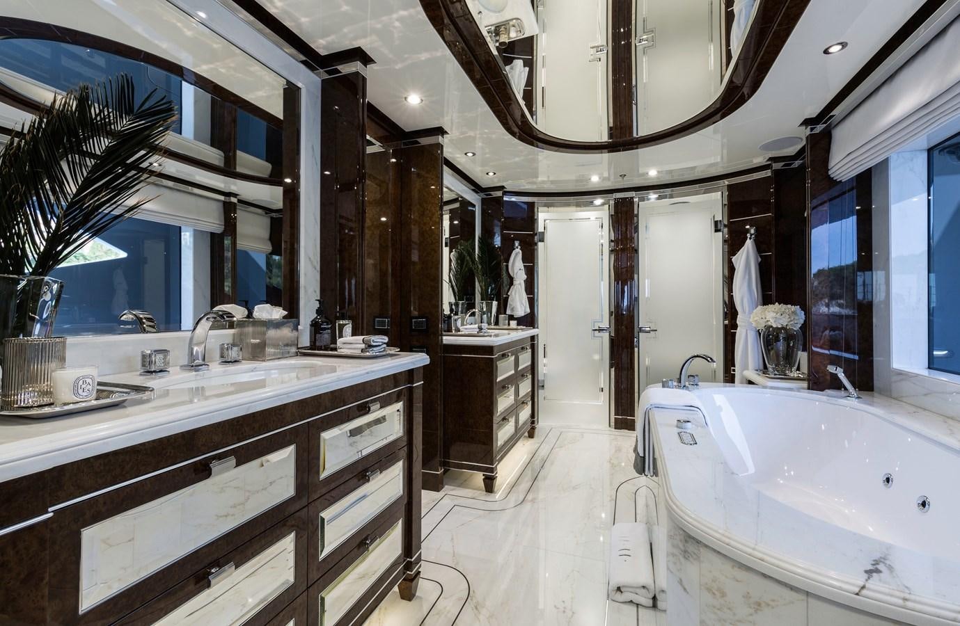 a bathroom with a large tub aboard SOUNDWAVE Yacht for Sale