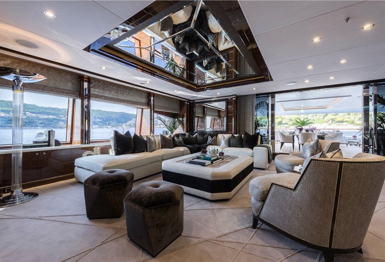a living room with a large glass ceiling aboard SOUNDWAVE Yacht for Sale