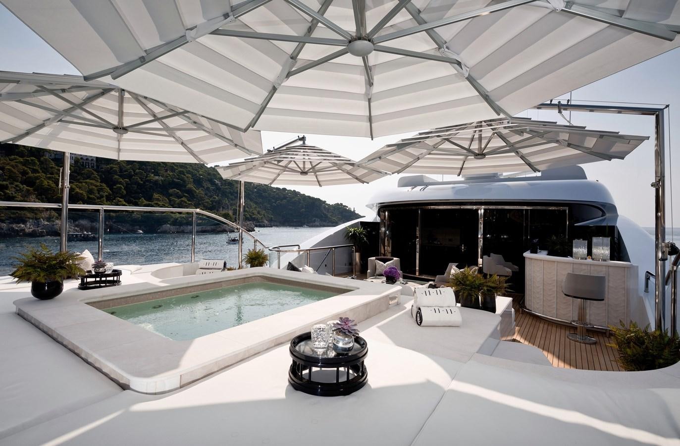 a large swimming pool aboard SOUNDWAVE Yacht for Sale