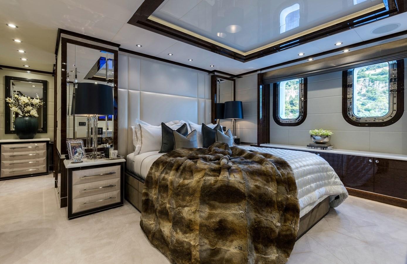 a bedroom with a large bed aboard SOUNDWAVE Yacht for Sale