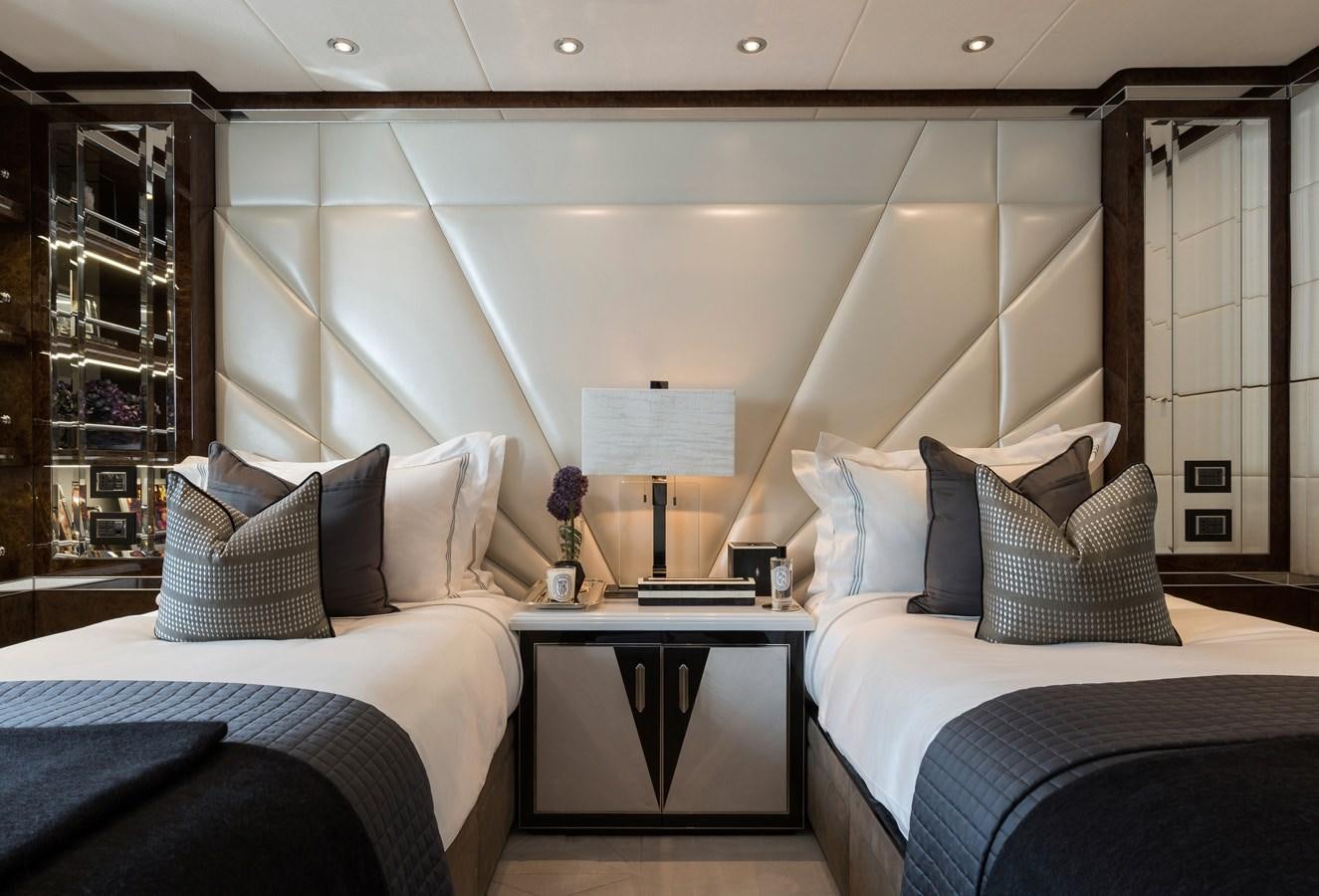 a room with two beds aboard SOUNDWAVE Yacht for Sale
