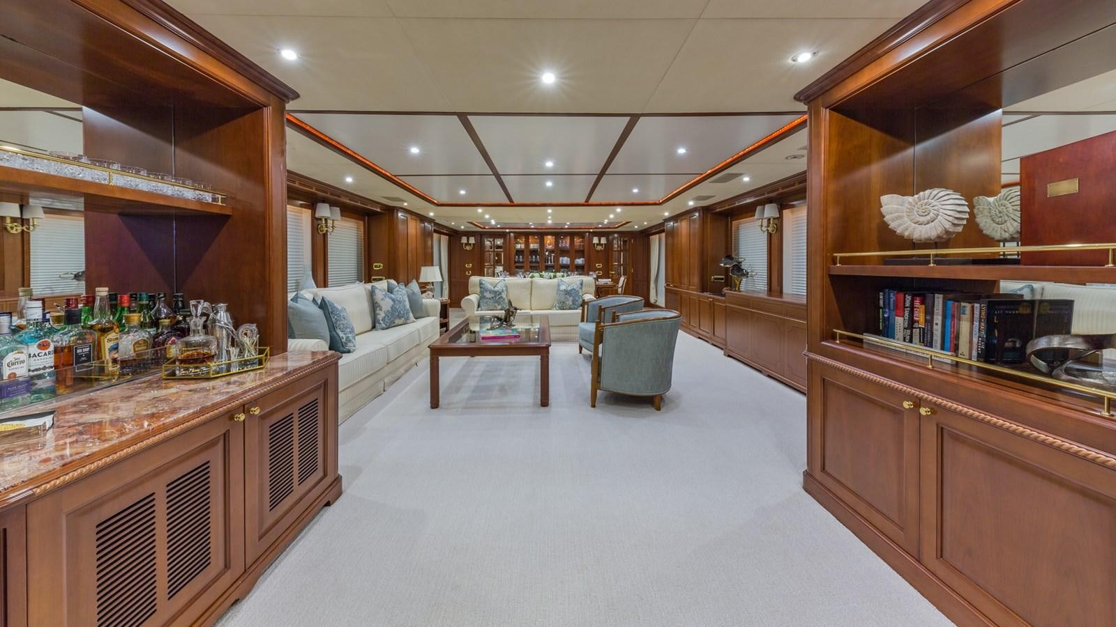a room with a bed and a desk aboard NAMASTE Yacht for Sale