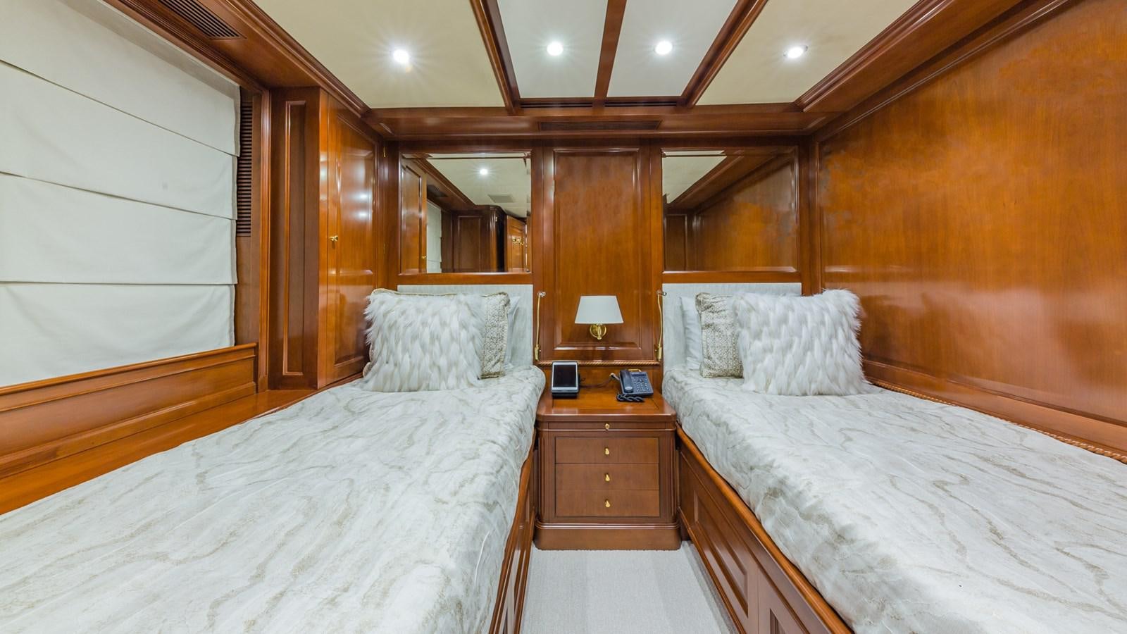 a room with two beds aboard NAMASTE Yacht for Sale