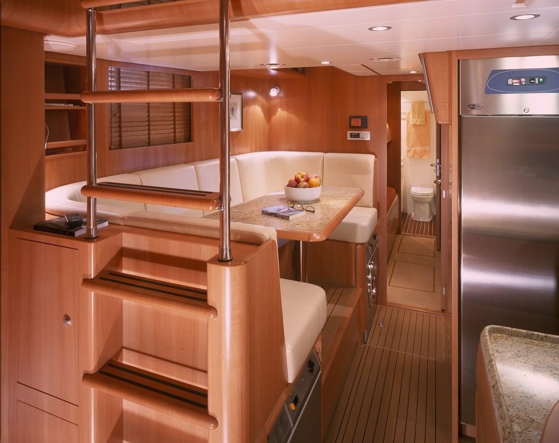 a kitchen with a large island aboard MBOLO Yacht for Sale