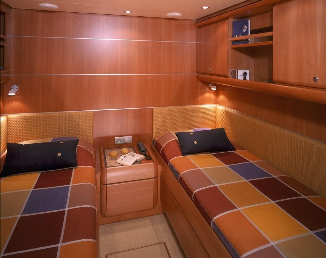 a room with bunk beds aboard MBOLO Yacht for Sale
