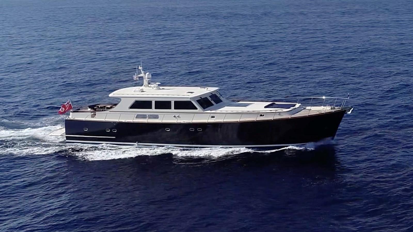 a boat on the water aboard ESSENCE OF CAYMAN Yacht for Sale
