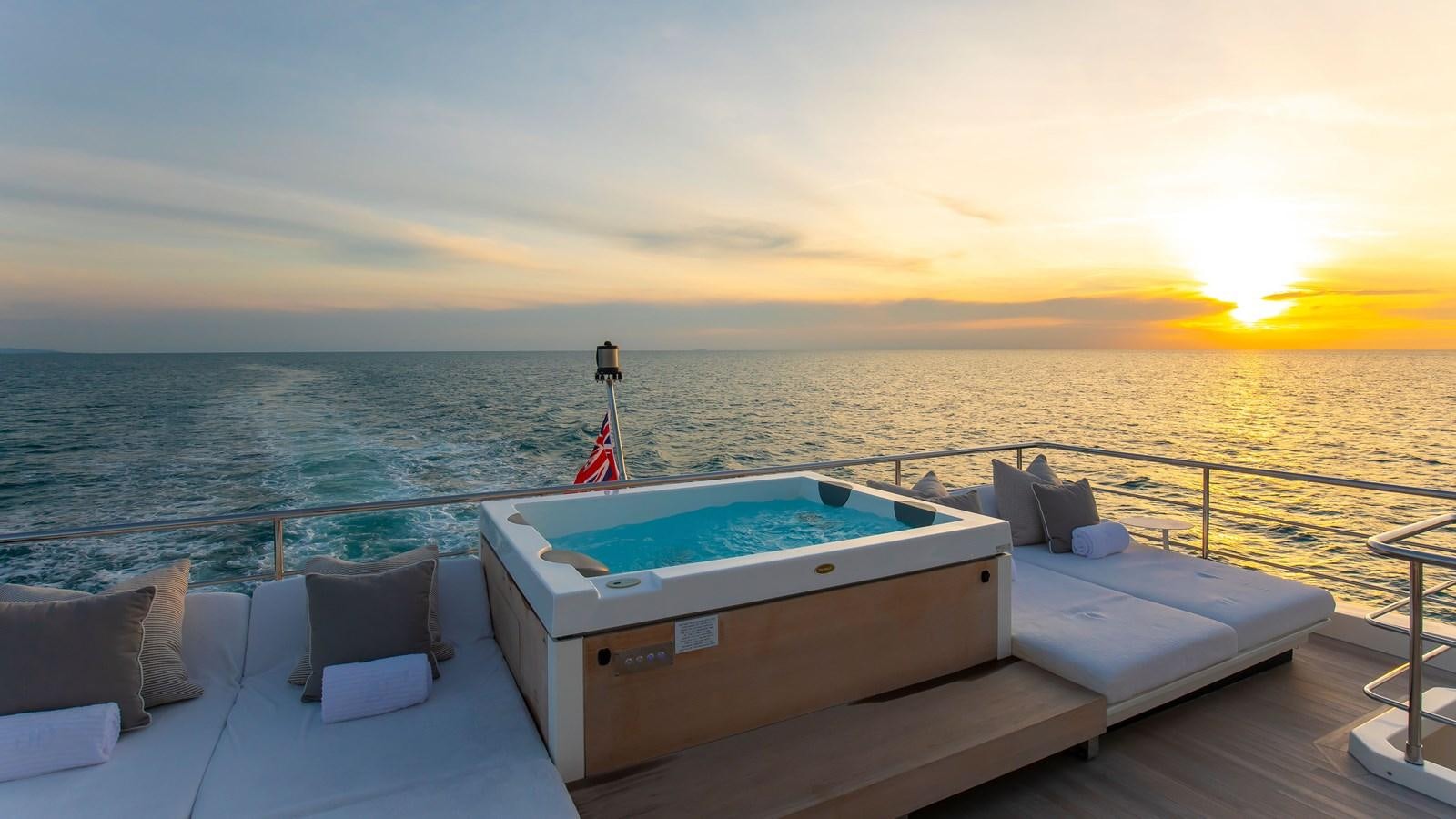 a boat on a large body of water aboard H Yacht for Sale