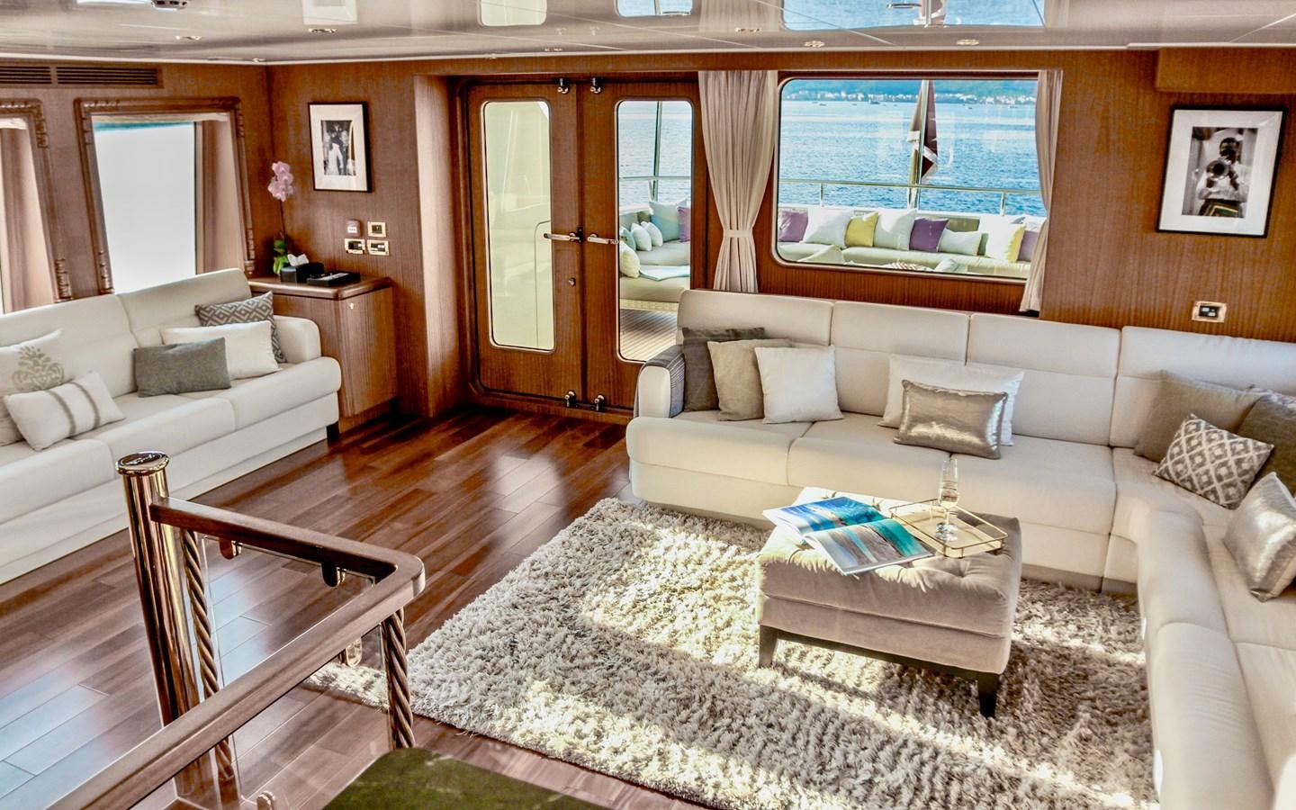 a living room with a couch and a table aboard BALTIC SEA Yacht for Sale
