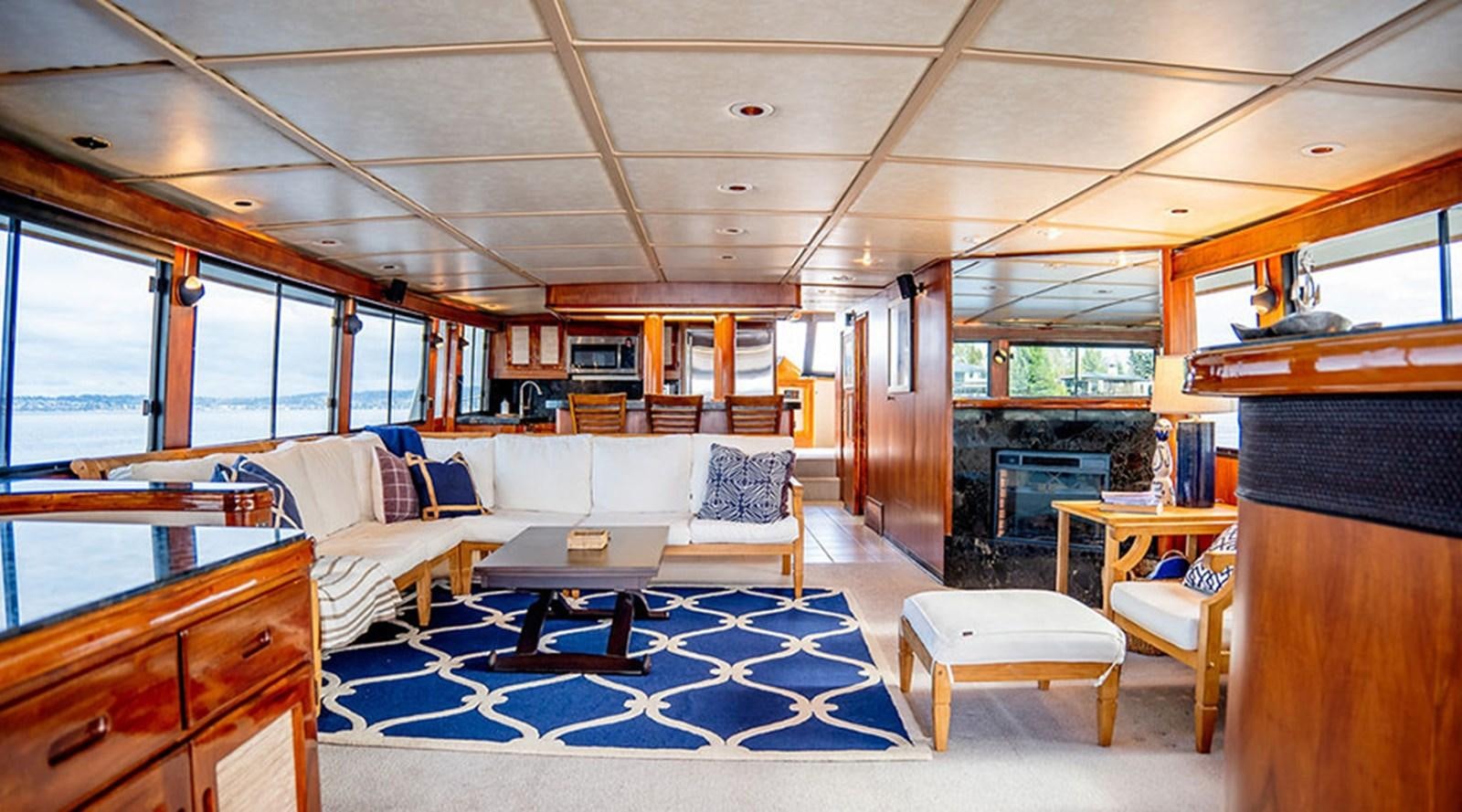 a living room with a blue floor aboard PACIFIC SHADOW Yacht for Sale