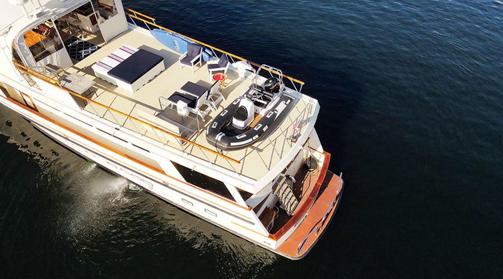 a large ship in the water aboard PACIFIC SHADOW Yacht for Sale