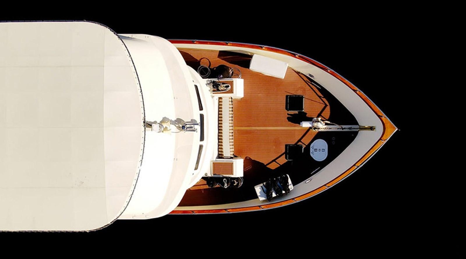 a white and orange model airplane aboard PACIFIC SHADOW Yacht for Sale