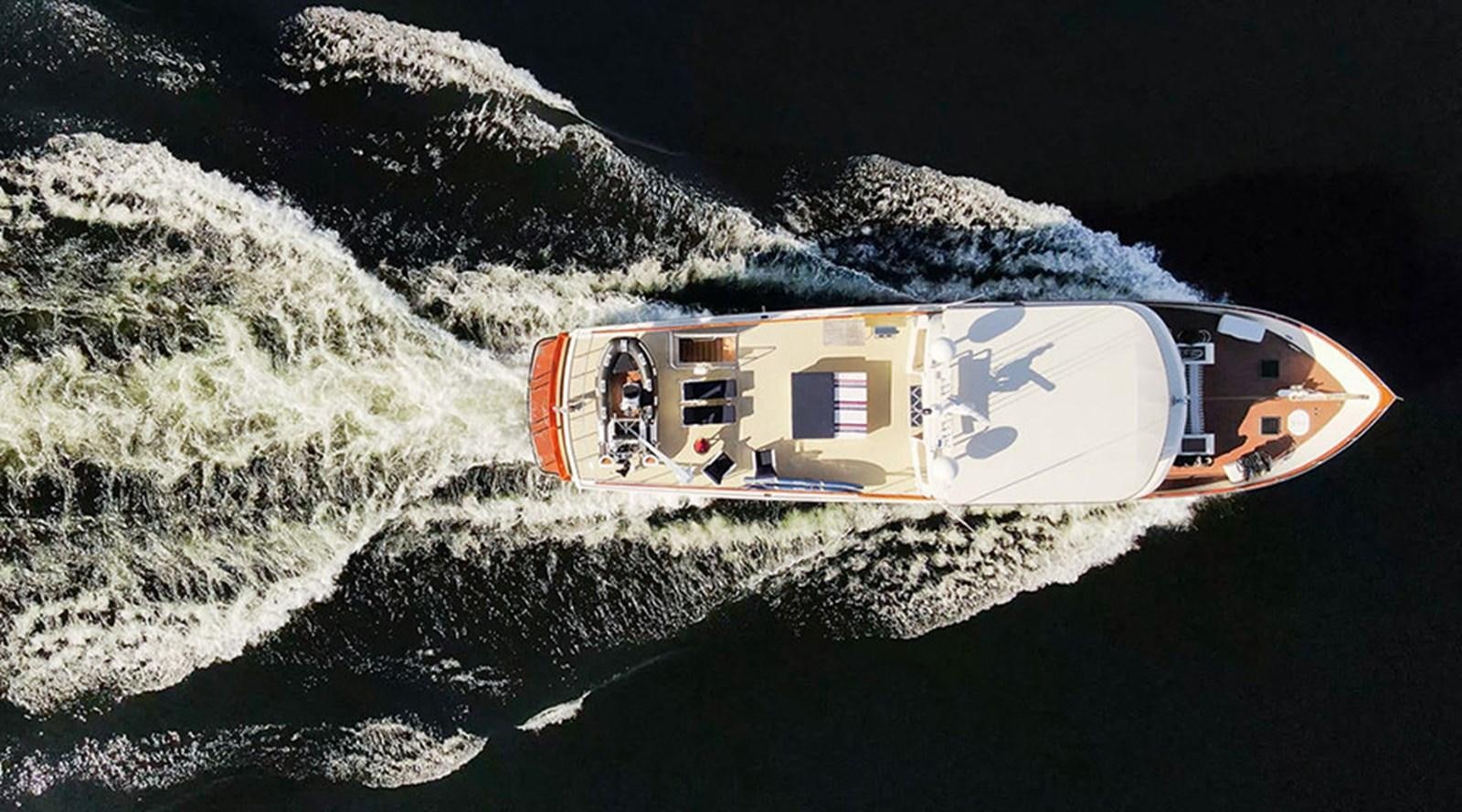 a space shuttle flying over a snowy mountain aboard PACIFIC SHADOW Yacht for Sale