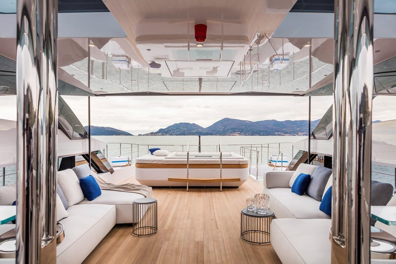 a room with a large window and a view of the ocean aboard NEVER BLUE Yacht for Sale