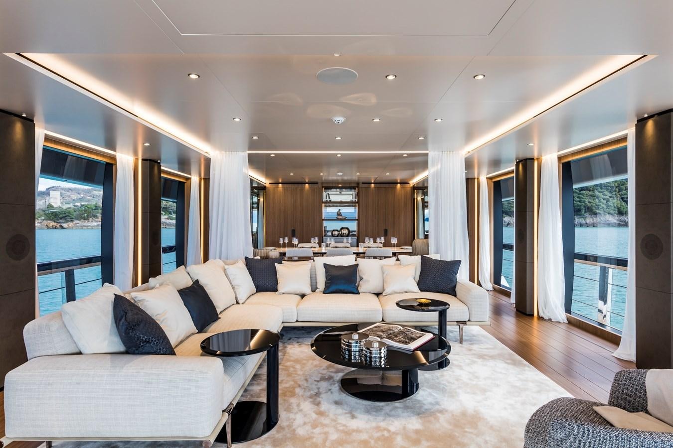 a living room with a large window aboard NEVER BLUE Yacht for Sale