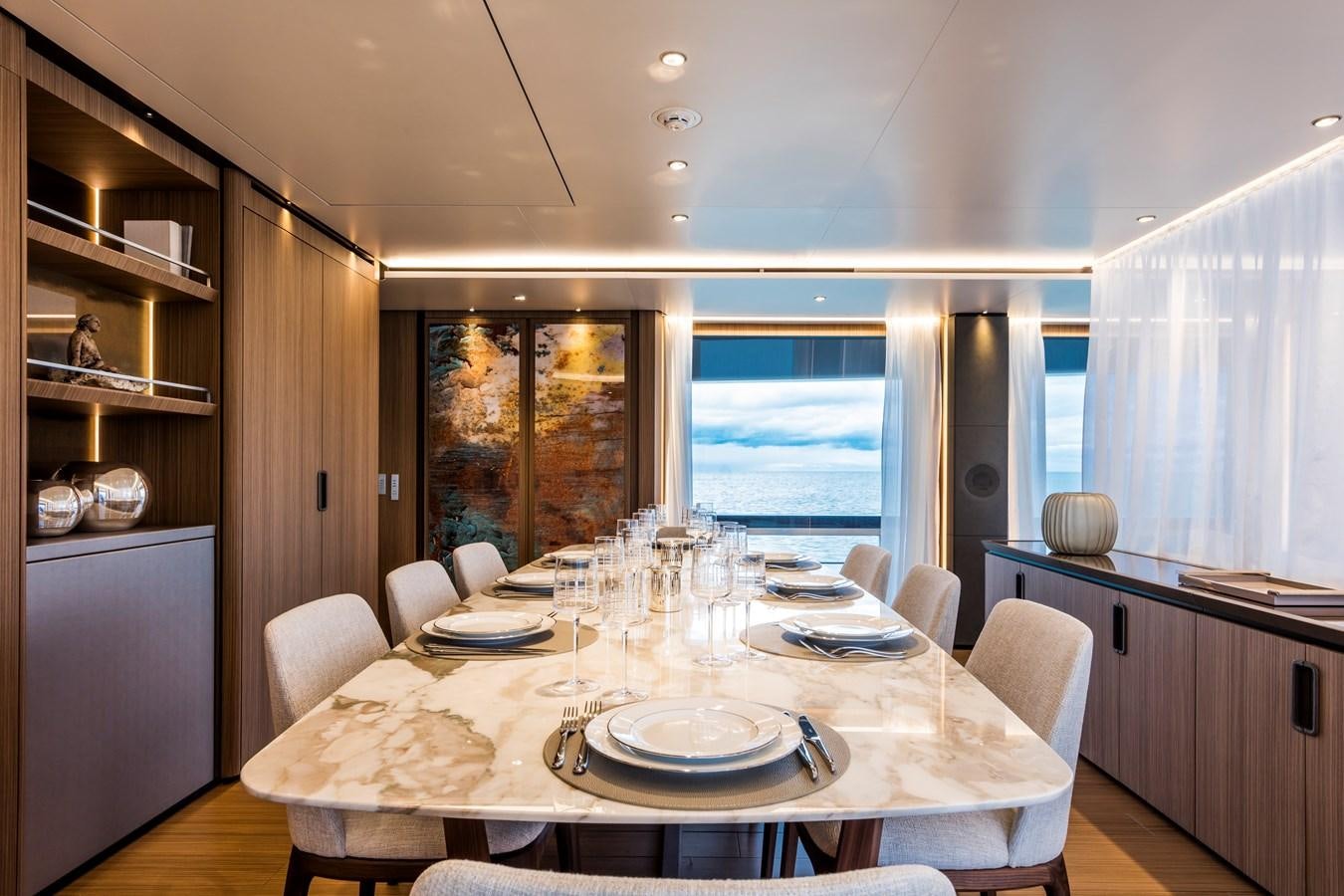 a dining table set for a dinner aboard NEVER BLUE Yacht for Sale