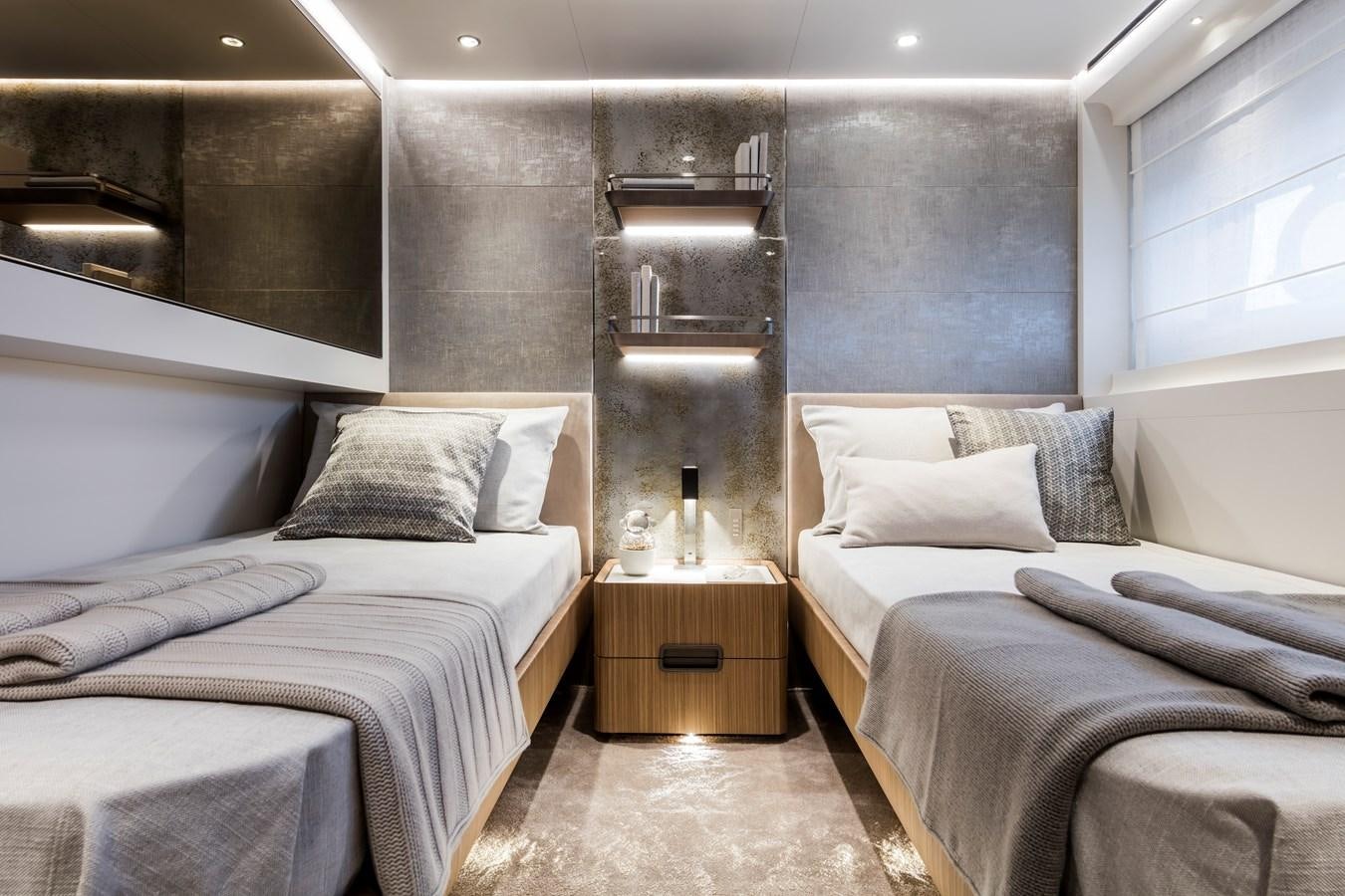 a room with two beds aboard NEVER BLUE Yacht for Sale