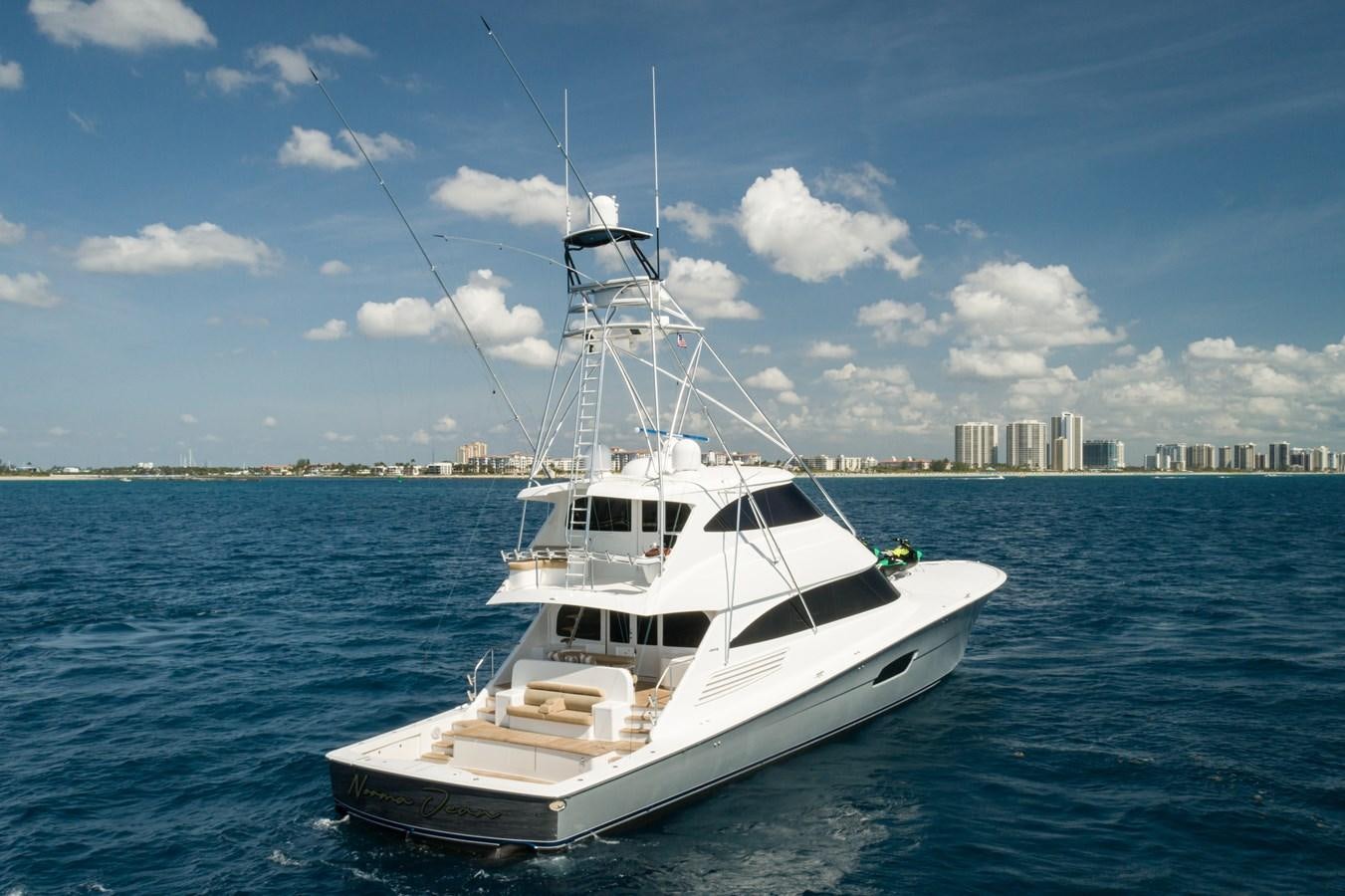 a white boat in the water aboard MAKARA Yacht for Sale