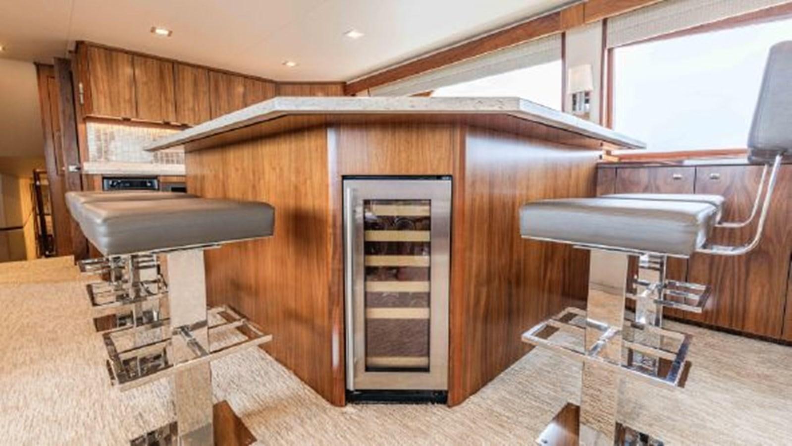 a wooden cabinet in a room aboard MAKARA Yacht for Sale