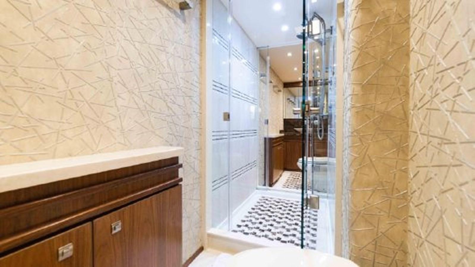 a bathroom with a mirror aboard MAKARA Yacht for Sale