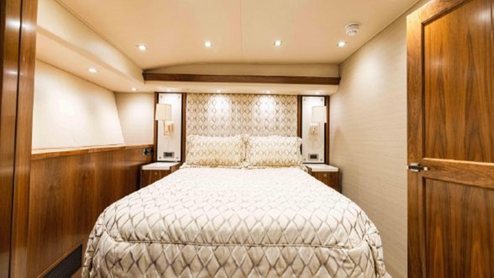 a bed in a room aboard MAKARA Yacht for Sale