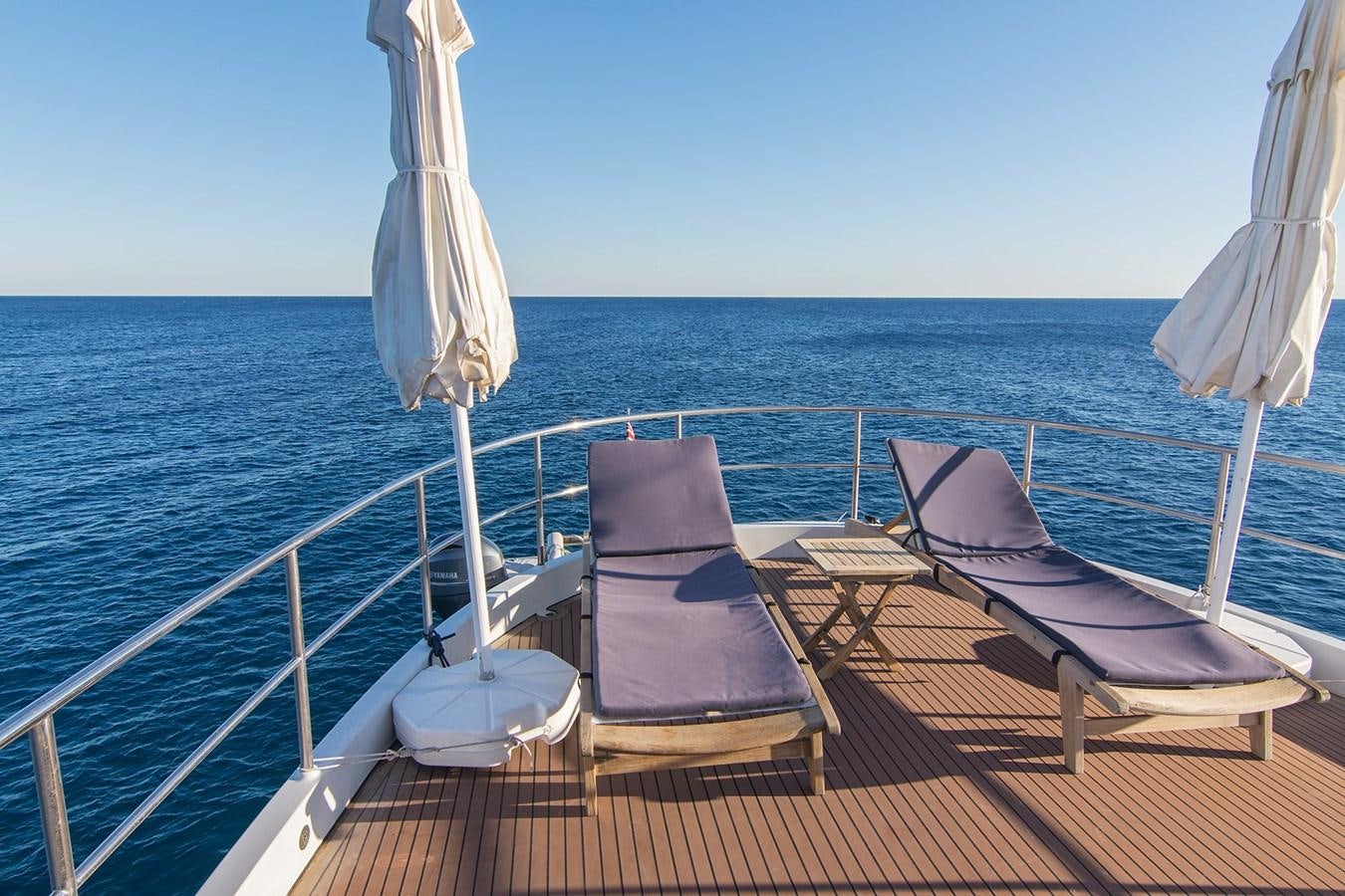 a boat on the water aboard MOONSHADOW NOA Yacht for Sale