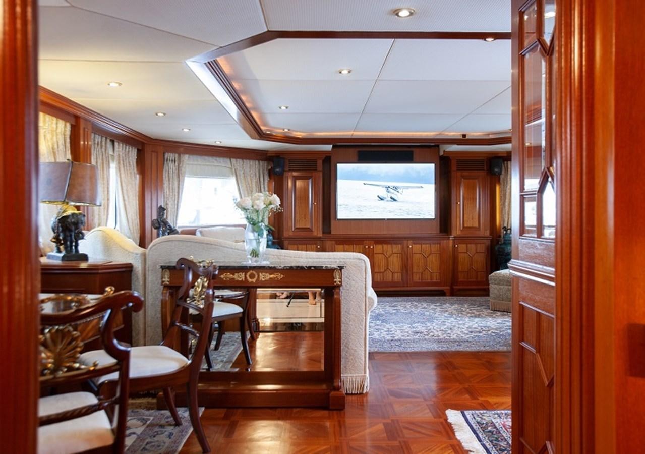 a dining room with a table aboard BLUE STAR Yacht for Sale